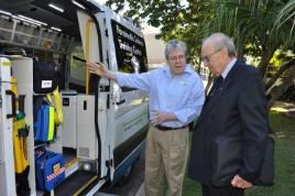 PhotoID:14842, Prof Brian Maguire explains the ambulance capabilities to Darvell Hutchinson AM from The John Villiers Trust
