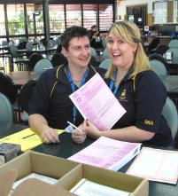 PhotoID:11224, College residents Aimee Wilson and Phillip Rickert help distribute Census forms