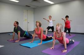 PhotoID:12306, Taking part in yoga classes in Gladstone are (back row) Charmaine Thompson and Debbie Hunt and (front row) Paul Hannah, Sandra Pugh and Valarie Hough.