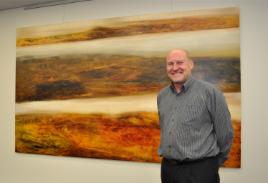 PhotoID:13144, Richard Dunlop with his painting in its new location at CQUniversity