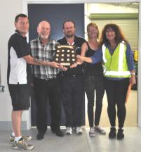 PhotoID:14407, Charles Gorton from CBH (centre) and lecturer Yvonne Toft (right) present the perpetual shield to L-R Duncan Bewick, Larry Cameron and Stacey Barry 
