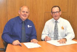PhotoID:11468, Vice-Chancellor Professor Scott Bowman and CQ NRL Bid Chief Executive Denis Keeffe at the signing ceremony