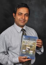 PhotoID:14944, Dr Zobaidul Kabir with his new book