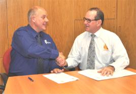 PhotoID:11467, Vice-Chancellor Professor Scott Bowman and CQ NRL Bid Chief Executive Denis Keeffe at the formal signing