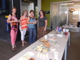 PhotoID:13812, CQUniversity's Dr Judith Brown, Maude Chapman, Dr Delma Clifton and Sandy McLellan with donations from the morning tea. 