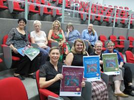 PhotoID:9303, Pearson representative Mandy Sheppard (front left) is pictured celebrating the project's success with CQUniversity contributors (clockwise from back right) Kadie Cheyney, Jennifer Jones, Lorna Moxham, Diane Goldsworthy, Trudy Dwyer, Sandra Walker, Judy Applegarth and Kerry Reid-Searl