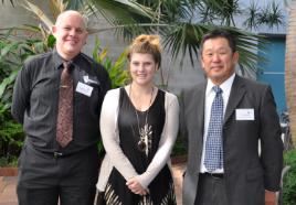 PhotoID:12417, Destiny is congratulated by Vice-Chancellor Professor Scott Bowman and Ted Mitani, representing the Iwasaki company and Iwasaki Foundation