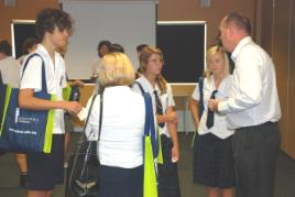 PhotoID:11613, Noosa launch including Dr Scott Richardson discussing tourism programs with St Andrews Anglican College students and Guidance Officer Sheridan Sugden