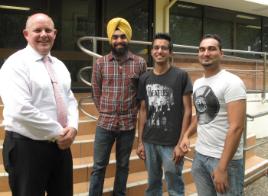 PhotoID:11584, VC Scott Bowman explains details of the SBT support to Indian students based at Rockhampton Campus, L-R Balpreet Singh, Sanam Deep and Shaun Kumar