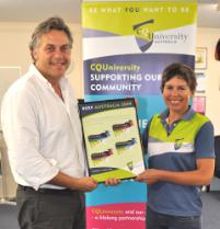 PhotoID:7631, CQUniversity's Suzi Blair presents a gift to Beef Australia CEO Noel Landry