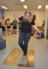 PhotoID:11085, Charlotte Merrick uses some of the sport science equipment during Science Camp.