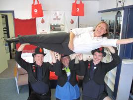 PhotoID:11707, CQUni gymnasium staff L-R Brendan Kanowski, Shannan Rye and Billy Sarandria are keen to hoist blood stocks, as well as Rachael Speechley from the Australian Red Cross Blood Service