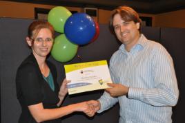 PhotoID:13314, Sharleen Keleher is congratulated by First Year Experience Officer Chris Cook during the Bundaberg presentation dinner