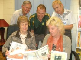 PhotoID:9053, Reviewing the Childwise program are Back L-R: National Director Bill Grosser, teacher Tony Fraser, Peirson Services rep Sean McCartney and Front: National Director Jill Grosser and Dr Rosie Thrupp from CQUniversity.