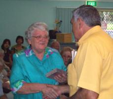 PhotoID:5380, Author Margaret Keane receiving her CDs from 4YOU President Doug Allwood