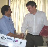 PhotoID:4022, Hamish Holewa with Dr Thomas Koilparampil,   Chief Editor of AJC and Head of Medical Oncology, Regional Cancer Care Centre, Trivandrum