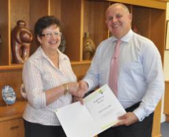 PhotoID:10186, Patricia Lieschke accepts her Staff Service Award after 35 years at CQUniversity