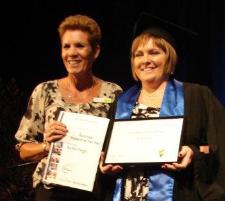 PhotoID:13760, Prof Huntly (left) presents an award to TAFE Business Studies graduate Kelli Pegg. Kelli graduated with a Diploma of Business Administration and was the top performing student in the award. 