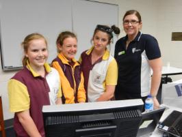 PhotoID:12538, Sarina State High School students in Year 8 Brooklyn Patroni, Ashlee Langdon and Macey Ronald with CQUniversity's Widening Participation Officer Laura Rowley. 