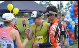 PhotoID:13165, Runners celebrate at the finish line