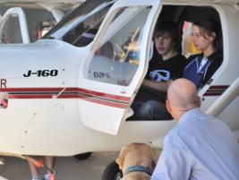 PhotoID:9210, Ron Bishop puts Emma Cherry and Jonathan Ward in the hot seat during their work experience program.