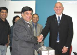 PhotoID:10853, Mr Sharma receives a welcome gift from the Vice-Chancellor