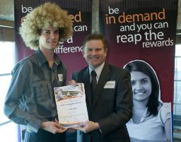 PhotoID:7904, Carl Harch accepts the 2009 bursary.