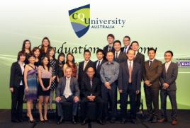 PhotoID:12156, Associate Professor Ken Bruce, CEO/Campus Director of CQU IHL, seated with Patrick Loke, CEO of Melior International College and Director of CQU IHL, along with staff from both companies at the recent Graduation Ceremony in Singapore.