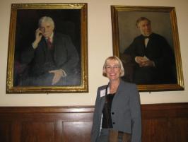 PhotoID:14522, Assoc Prof Leonie Short in front of the painting of the first dean of the Harvard School of Dental Medicine