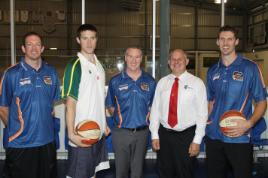 PhotoID:12328, QUniversity Vice-Chancellor Professor Scott Bowman flanked by Taipans players and coaching staff, including future Olympian Aron Baynes (second from left).