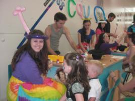 PhotoID:10663, Students including Morgan Garrity (foreground) liven up shopping to raise funds for a recreation area