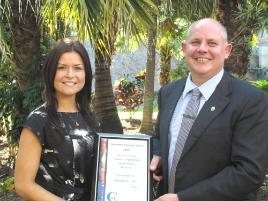 PhotoID:9929, Vice-Chancellor Professor Scott Bowman congratulates Natasha Toon on her Trainee of the Year award