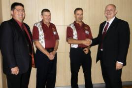 PhotoID:12082, Professor Pierre Viljoen (left) and Professor Scott Bowman (right) with Rotary Club member Alan Woodhead (second from left) and Rotary Club President Chris Bijsterveld