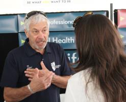 PhotoID:12855, Gerry Dares talks to an Open Day attendee