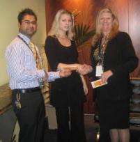 PhotoID:4105, Finance Manager Vikas Dhawan,  student Natalia Supova and Campus Director Barbara Abou-Lehaf