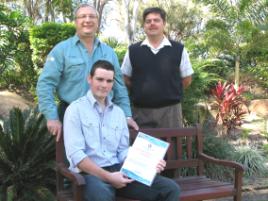 PhotoID:7636, Josh Ward receives his scholarship from QAL Managing Director Phil Campbell and CQUniversity Gladstone Head of Campus, Dr Pierre Viljoen