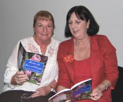 PhotoID:8927, Glenys Kirkwood discusses the new book with Mayoress Gail Carter