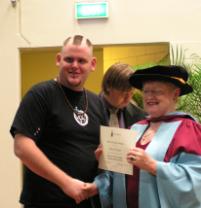 PhotoID:4923, Vladymir Percival gets his certificate from Professor Angela Delves