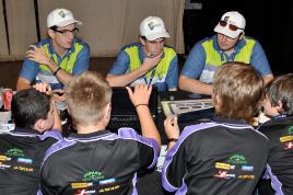 PhotoID:9833, Carrying out their judging duties are first-year Engineering students L to R Matthew Lowrey, David Byrne and Tom Craig