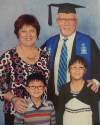 PhotoID:11814, Brett and family at his most recent graduation