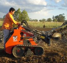 PhotoID:4029, CQU researcher Ajay Sharma prepares track-side areas for growing native plants as part of a Rail CRC project.  