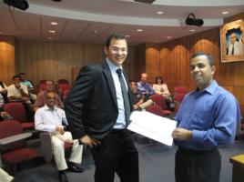 PhotoID:12392, GE Energy visitor Dragos Tita chats with CQUniversity's Power Engineering Research Group (PERG) leader Dr Aman Maung Than Oo before delivering a technical seminar on Rockhampton Campus