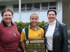 PhotoID:4570, Karen Woodley (left), Research Worker from the Centre and Heather Nancarrow present the trophy