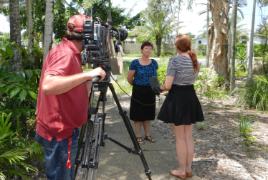 PhotoID:12007, Visitor Dr Caroline Perkins is interviewed by a Mackay TV crew