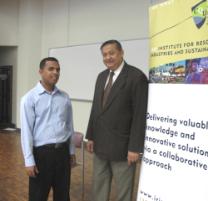 PhotoID:8757, Distinguished visiting speaker Professor Akhtar Kalam chats with CQUniversity's Dr Amanullah M Than Oo before delivering his seminar on 'Energy efficiency and its strategic Impact to the consumers'