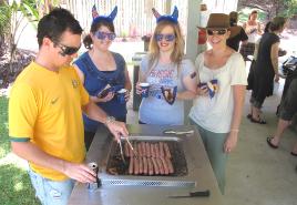 PhotoID:10325, Helping to christen the new barbecue structure are (L-R) OHS Project Officer Sean Peckover, Employee Relations Advisors Emma Brunner and Tameka Bailey, along with newly-arrived Professional Development Officer Tanya Rutherford