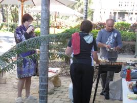 PhotoID:9235, Professor Brenda Happell (in gown), Dr Jim Douglas and Yvonne Holbeck helped serve participants in the Stress Down Day breakfast