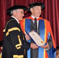 PhotoID:6825, Current Chancellor Rennie Fritschy congratulates former Chancellor, Hon Justice Stan Jones AO