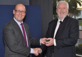 PhotoID:12623, Stafford Shepherd, Senior Ethics Solicitor with the Queensland Law Society presenting CQUniversity Solicitor and Special Adviser to Law Wayne Jones with his QLS 25 Years of Service award