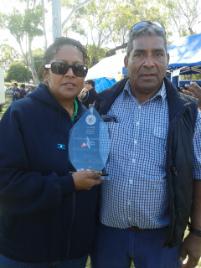 PhotoID:12723, Melinda Mann-Yasso pictured with her father and award at last week's NAIDOC Family Expo